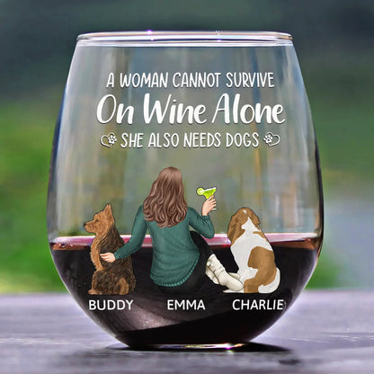 A Woman Cannot Survive On Wine Alone She Also Needs Dogs - Personalized Wine Glass | Dog Mom Gift - Personalize Memories