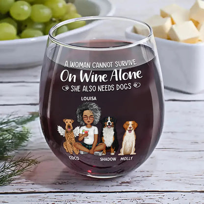 A Woman Cannot Survive On Wine Alone She Also Needs Dogs - Personalized Wine Glass | Dog Mom & Dad Gift - Personalize Memories